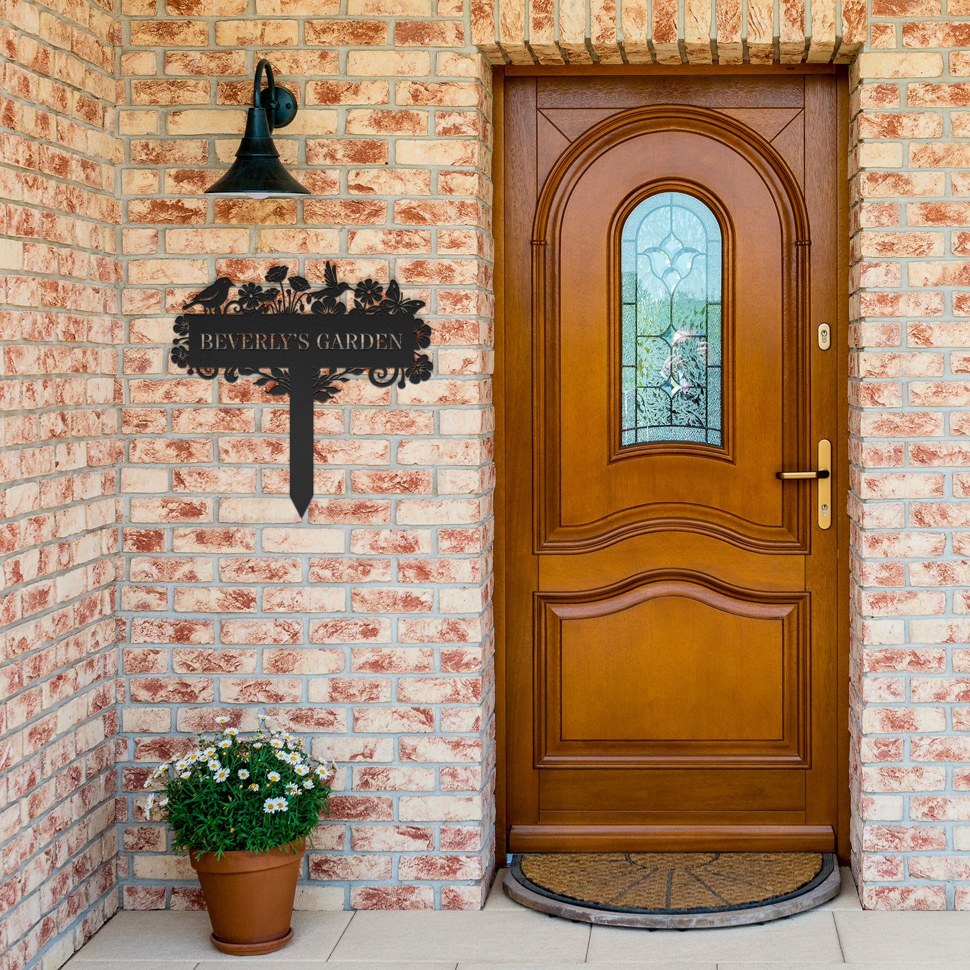 Custom_Metal_Bird_and_Flower_Garden_Sign_Black_Brick_Entrance_Mockup.png