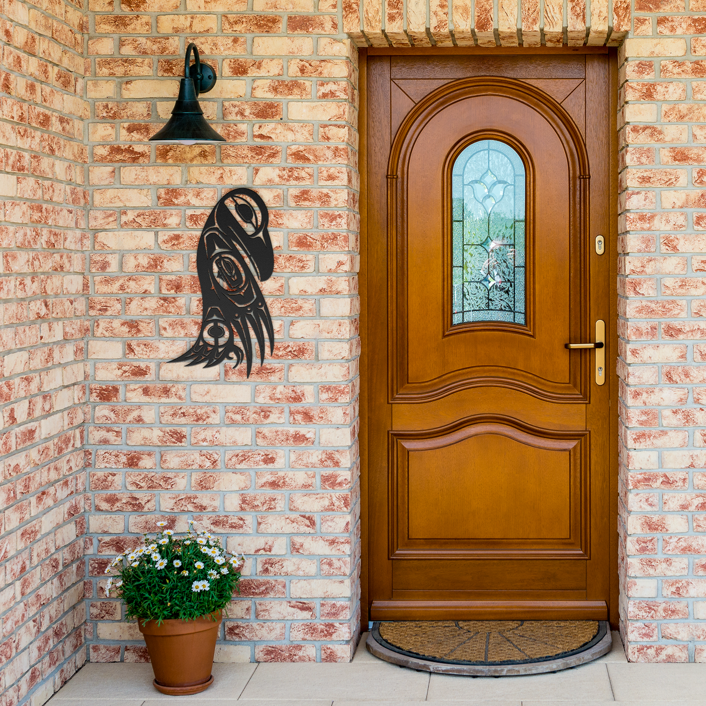Northwest_Tribal_Raven_Totem_Pole_Metal__Black_Brick_Entrance_Mockup.png